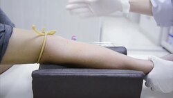 taking blood tests in a research laboratory Stock Footage