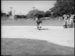B/W 1962 NY Mets player Felix Mantilla catches ball + throws to Charlie Neal at spring training Stock Footage