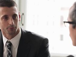 MS DS R/F businessmen discussing project in office conference room Stock Footage