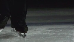 The blade of a figure skater toe picks, jumps and spins off the ice. Stock Footage