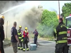 A multi-alarm blaze that burned for hours was declared under control after it consumed the vacant Reliable Tire Co. factory building in southern New Jersey and damaged several nearby row homes News Clip