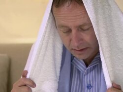 Man with a cold inhaling steam Stock Footage