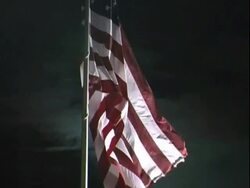 American flag on full moon night. USA symbol. Stock Footage