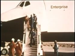 Astronauts exit the Space Shuttle Enterprise at Edwards Air Force Base in California. News Clip