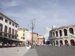 MS PAN Cafes and Restaurants at Piazza Bra and Tourists roaming in front of Arena di Verona / Verona, Veneto, Italy Stock Footage