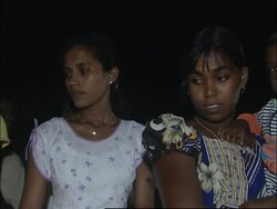 Relatives light oil lamps where train hit by tsunami News Clip