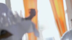 Waiter arranges drinking glasses on dining table Stock Footage
