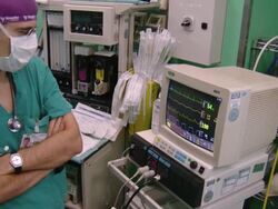  MS PAN Anesthetist doctor monitoring on computer monitor / Cagliari, Sardinia, Italy Stock Footage