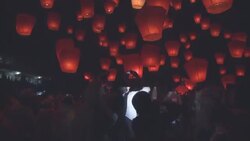 Participants release paper lanterns into the sky during a festival in Taipei, Taiwan. Stock Footage