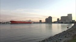 A large boat floats down the Mississippi River near New Orleans. Stock Footage