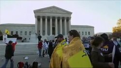 Demonstrators gathered outside the Supreme Court Tuesday, where justices are taking up the key question in the constitutional challenge to President Barack Obama's historic health care overhaul. News Clip