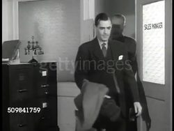 1946: BUILDING HOLDUPS: Sign: Metal Products Co. Dowd. DRAMATIZATION: Men talking in office, male doesn't know when he can deliver, OPA price controls keeping them from making profit. Instructional Video