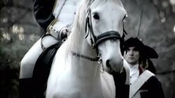 A mounted officer with leads marching soldiers in French Revolution uniforms. Stock Footage