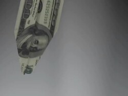 Dollar bill plane falls down concept - loopable Stock Footage