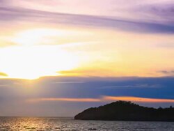 Timelapse-sunset and island.(zoom in) Stock Footage