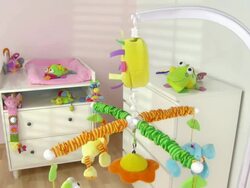 HD: Crib Toy Twirling In Beautiful Nursery Room Stock Footage