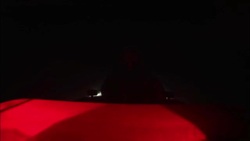 A rescue worker operates a hovercraft during a blizzard on a night mission. Stock Footage