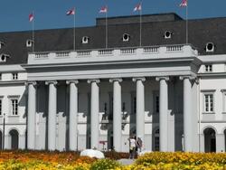 MS Couple standing and watching electoral palace / Koblenz, Rhineland-Palatinate, Germany Stock Footage