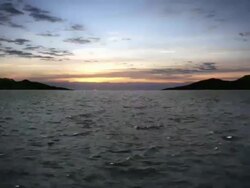 Sunset Ocean Fly-over Stock Footage