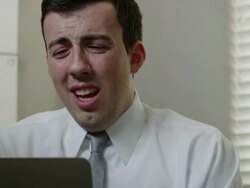 Close up of unhappy, crying businessman talking and using laptop / Orem, Utah, United States,  Stock Footage