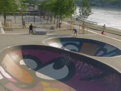 Skateboarder in colorful skatepark,lyons,ZO Stock Footage