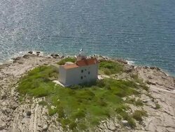 MS AERIAL DS ZO View of light house in Adriatic sea / Korcula, Dubrovnik Neretva County, Croatia Stock Footage
