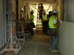 Construction Workers in Hallway Stock Footage