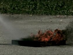 High speed water fire extinguisher, putting out fire Stock Footage