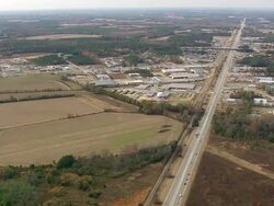 WS AERIAL View of 52 Highway with town area / South Carolina, United States Stock Footage