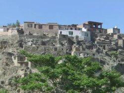 MS View of Stone bricks and clay homes on  rocky hillside  / Kabu,Kabul,Afghanistan Stock Footage