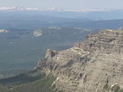 WS AERIAL Shot of rock mountain wall / Wyoming, United States Stock Footage