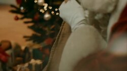 Santa Clause brings presents to familys house Stock Footage