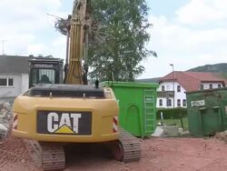 MS Bulldozer moving debris to trolley / Saarburg, Rhineland-Palatinate, Germany Stock Footage
