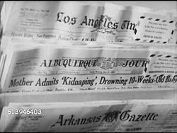 1939: TIME & LIFE BUILDING: VS Male being handed newspaper inside Time Life lobby, home town newspapers on stack, female assistant finding newspaper for male. Rockefeller Center, Manhattan, NYC, subscribers, club members Instructional Video