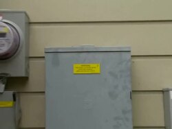 Smart meter signage on house at Pecan Street Inc project Stock Footage