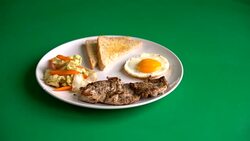 black peppers grilled pork steak on green screen Stock Footage