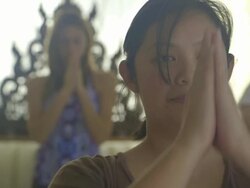 MS R/F Lady smiling and doing in yoga studio with practitioners / Los Angeles, California, United States Stock Footage