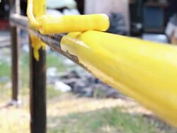 HD : Worker painting on pipe barrier Stock Footage