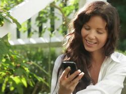 Lifestyle Texting garden Stock Footage