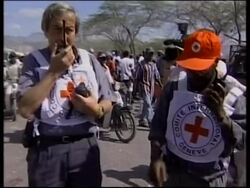 Aid convoy heads north, unrest, Aristide comments News Clip