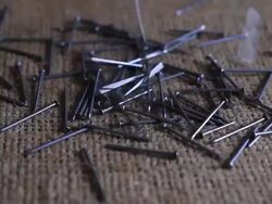 Hammer and nails Falling on a Table Stock Footage