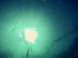 Free diver emerging from the abyss Stock Footage