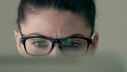 Businesswoman looking at information on the computer screen. Stock Footage