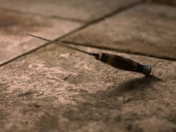 High speed Knife falling on pavement Stock Footage