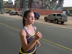 MS POV Girl jogging with ipod and earphone on street /New York, New York, United States Stock Footage