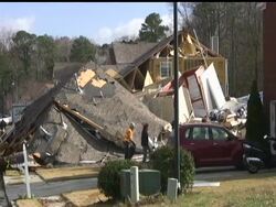 Residents of a north Atlanta suburb hit by a tornado begin a cleanup from a storm bringing winds as high as 130 miles per hour. At least 50 homes were destroyed. News Clip