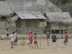 WS children playing game of kick volleyball / Xam Neua, Laos Stock Footage