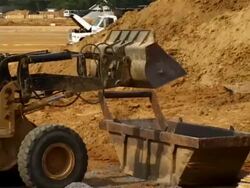 Frontend Loader Dumps Stock Footage