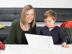 Mom and toddler on laptop Stock Footage