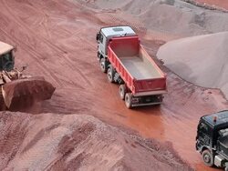 WS Crane collecting mud from  quarry and putting in other truck / Taben-Rodt, Hesse, Germany Stock Footage